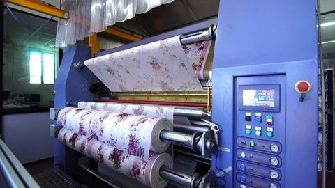 Industrial sublimation printer for digital printing on fabrics. Modern textile i Stockbeeldmateriaal 105382771