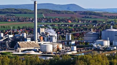 Industrial Sugar Processing Facility with Tanks, Pipelines and Energy System Stock Photos