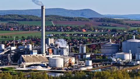 Industrial Sugar Processing Facility with Tanks, Pipelines and Energy System Stock Photos