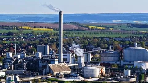Industrial Sugar Processing Facility with Tanks, Pipelines and Energy Systems Stock Photos
