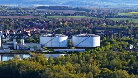 Industrial Sugar Processing Facility with Tanks, Pipelines and Energy Systems Stock Photos