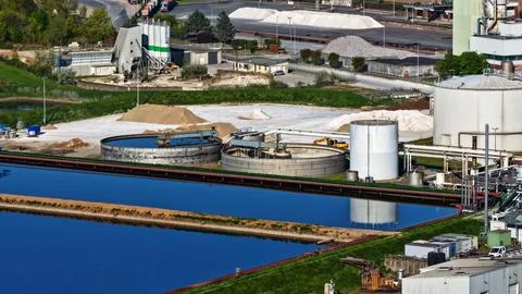 Industrial Sugar Processing Facility with Tanks, Pipelines and Energy Systems Stock Photos