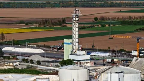 Industrial Sugar Processing Facility with Tanks, Pipelines and Energy Systems Stock Photos