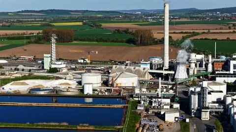 Industrial Sugar Processing Facility with Tanks, Pipelines and Energy Systems Photos