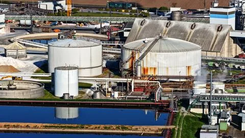 Industrial Sugar Processing Facility with Tanks, Pipelines and Energy Systems Stock Photos