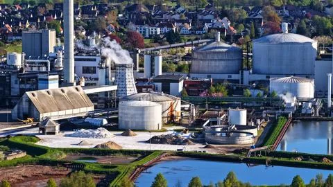 Industrial Sugar Processing Facility with Tanks, Pipelines and Energy Systems Stock Photos