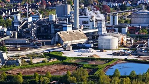 Industrial Sugar Processing Facility with Tanks, Pipelines and Energy Systems Stock Photos