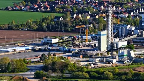 Industrial Sugar Processing Facility with Tanks, Pipelines and Energy Systems Stock Photos