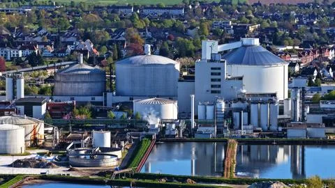 Industrial Sugar Processing Facility with Tanks, Pipelines and Energy Systems Stock Photos
