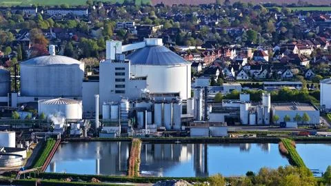 Industrial Sugar Processing Facility with Tanks, Pipelines and Energy Systems Stock Photos
