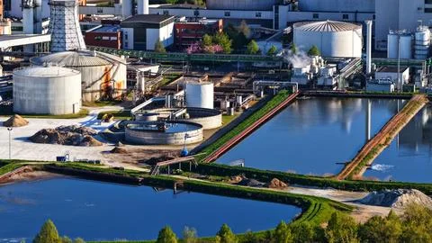 Industrial Sugar Processing Facility with Tanks, Pipelines and Energy Systems Stock Photos