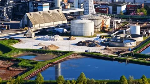 Industrial Sugar Processing Facility with Tanks, Pipelines and Energy Systems Stock Photos