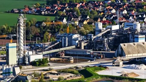Industrial Sugar Processing Facility with Tanks, Pipelines and Energy Systems Stock Photos