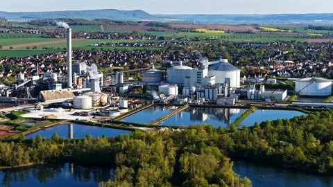 Industrial Sugar Processing Facility with Tanks, Pipelines and Energy Systems Stock Photos