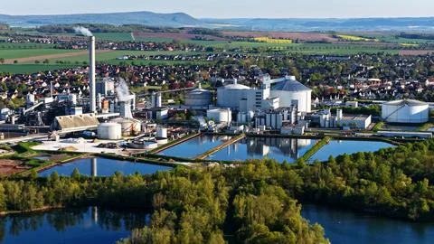 Industrial Sugar Processing Facility with Tanks, Pipelines and Energy Systems Stock Photos