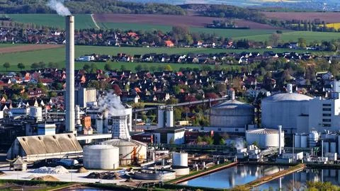 Industrial Sugar Processing Facility with Tanks, Pipelines and Energy Systems Stock Photos