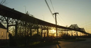 Industrial - Sunset Through Large Bridge - 4K Slow Motion Video stock 86136513