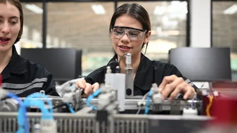 Industrial technicians working with machine maintenance Stock Footage 241522777
