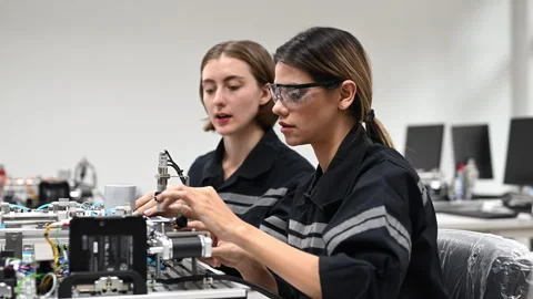 Industrial technicians working with machine maintenance Stock Footage 241522915
