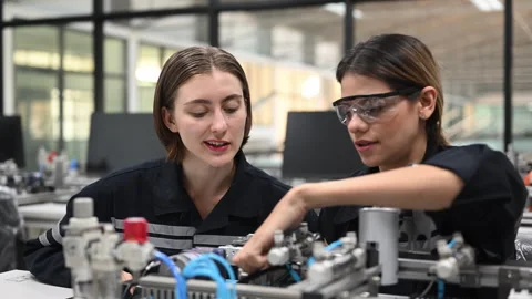 Industrial technicians working with machine maintenance Stock Footage 241523050