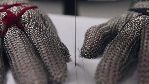 Industrial Textile Cutting Needle Between Protective Safety Gloves Macro Vídeos de archivo 328303693