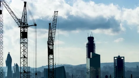 Industrial timelapse with tower cranes, high rise buildings under construction Stock Footage 153247408