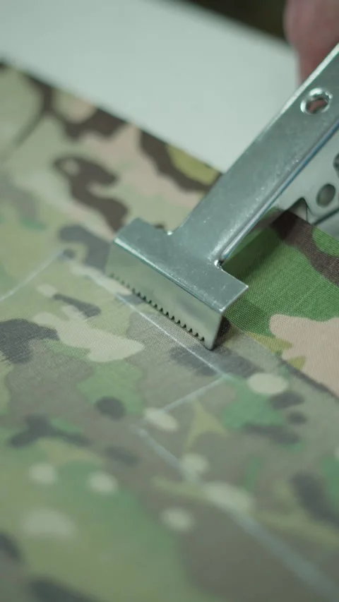 Industrial tool for fabric patterning. Concept of cutting out fabric. Stock Footage 293240742