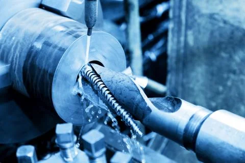 Industrial turning, threading machine at work Stock-Fotos