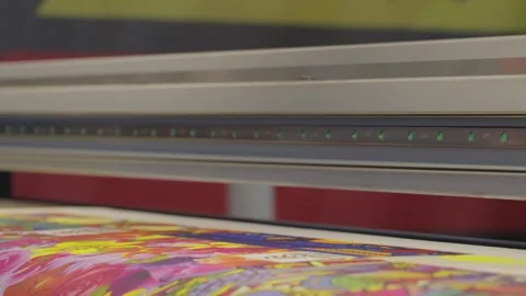 Industrial uv inkjet printer head printing vibrant floral patterns on fabri.. Stock Footage 336878820