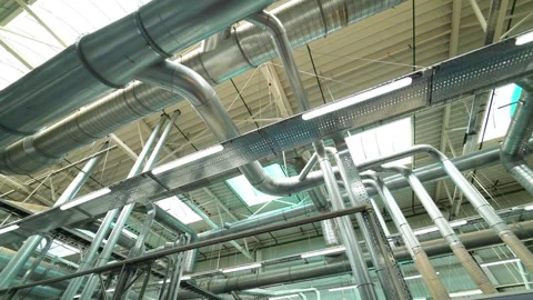 Industrial ventilation system and metal pipes on factory ceiling. Stock Footage 337545162