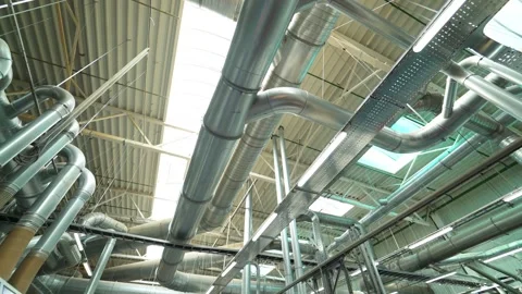 Industrial ventilation system with large metal pipes and air ducts in moder.. Stock Footage 337597772
