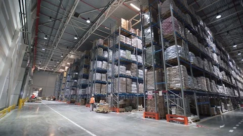 Industrial warehouse with boxes. Forklift Small cargo truck drives to warehouse Stock Footage 74972006