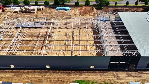 Industrial Warehouse Construction with Steel Framework Development Stock Footage 337748185