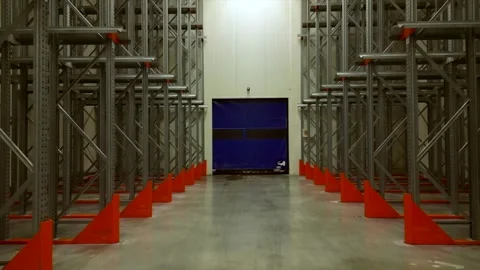 Industrial warehouse empty storage facility with extensive racks Stock Footage 327641992