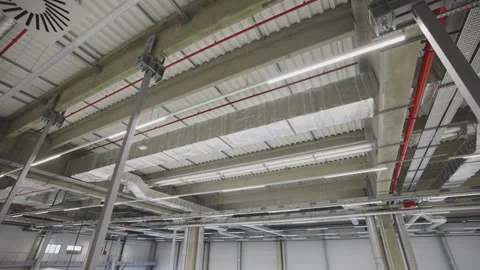 Industrial warehouse interior ceiling with ventilation systems and metal su.. Stock Footage 337404332