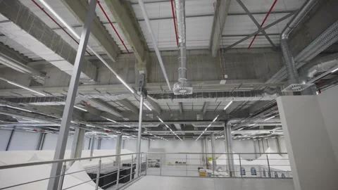 Industrial warehouse interior with modern ventilation system and high ceili.. Stock Footage 337482038