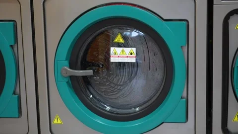 Industrial Washing Machine Running in Laundry Close Up Stock Footage 343790680