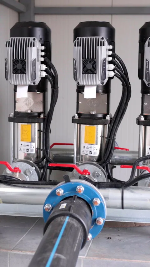 Industrial water pump system with three electric motors connected to pipes 스톡 동영상 338397884