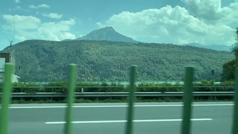 Industrial Waterfront and Mountain View From Highway Video stock 342264545