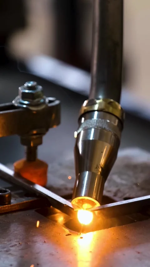 Industrial Welding Process at Factory Vertical Video Stockbeeldmateriaal 334881952