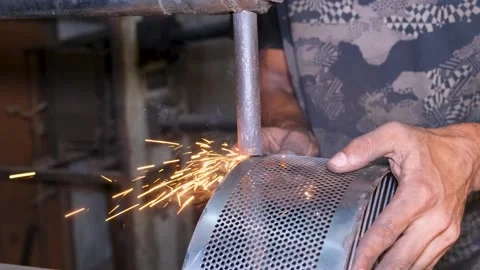 Industrial welding work on metal frame, bright sparks and smoke bursting Stock Footage 338203400