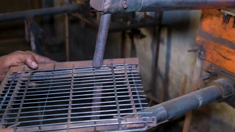 Industrial welding work on metal frame, bright sparks and smoke bursting Stock Footage 338203402