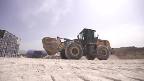 Industrial Wheel Loader Moving Soil at Construction Site in Uzbekistan ceramic Stock Footage 342227353