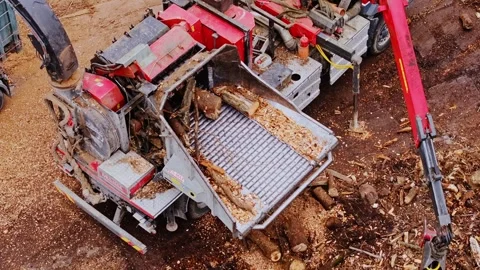 Industrial Wood Chipper Processing Logs - Aerial View Of Forestry Machinery Stock Footage 348616156
