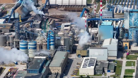 Industrial wood processing factory producing paper and pollution Stock Footage 339674607
