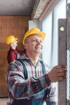 Industrial worker on construction site checking quality Stock Photos