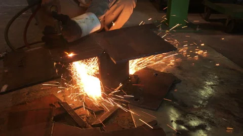 Industrial worker cutting steel by using metal torch Stock Footage 58007369