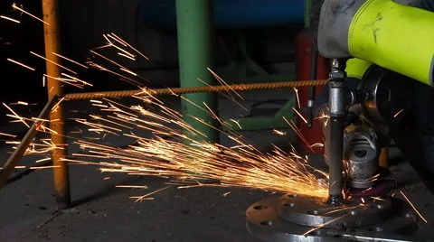 Industrial worker make a spark by grinding. Stock Footage 48189249