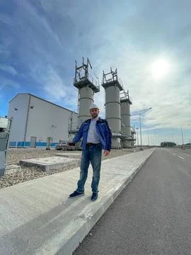 An industrial worker at a modern processing plant Stock Photos