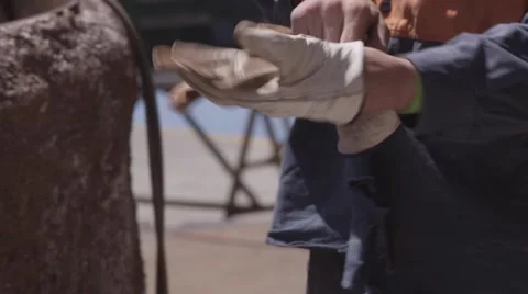 Industrial Worker Putting On Safety Gloves Stock Footage 55690799